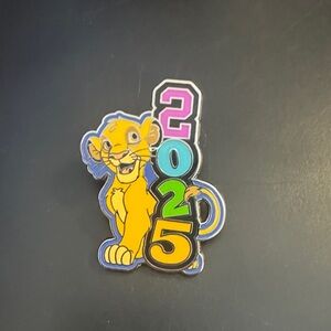 Disney Simba 2025 Pin - Yellow, Blue, Green, Pink.  Pin only (box for reference)